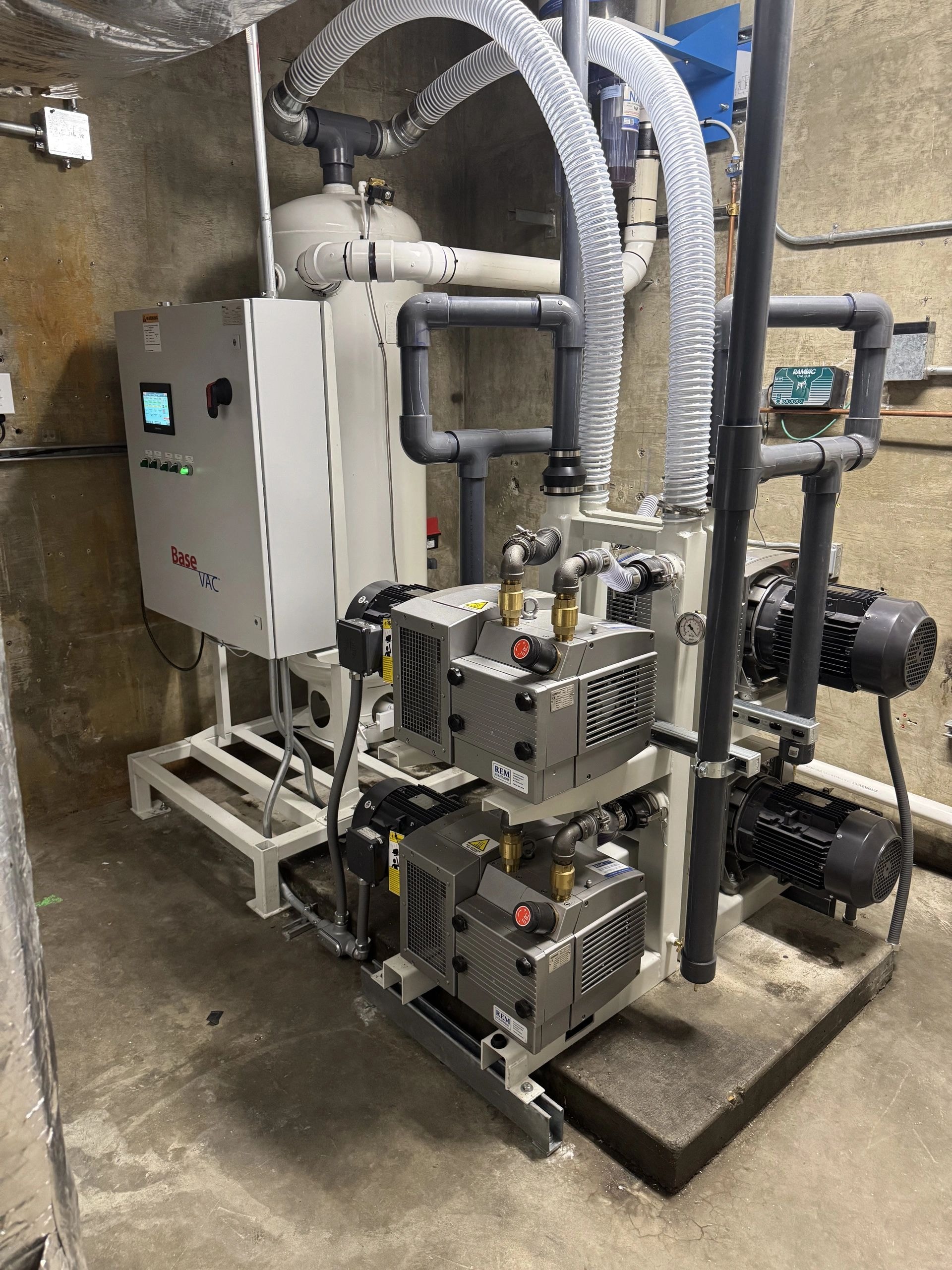 Vacuum pump system installation — VA McClellan dental project